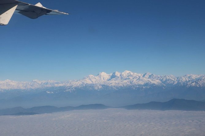 1 Hours Everest Mountain Flight From Kathmandu - Included value: pickup, car transfer, water, and ticket access