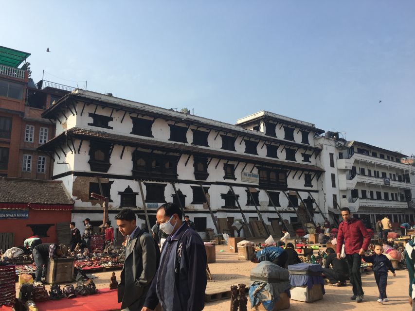 "Explore Kathmandu Rich Heritage: City Highlights Bus Tour" - Stop-by-stop: Swayambhunath to Pashupatinath