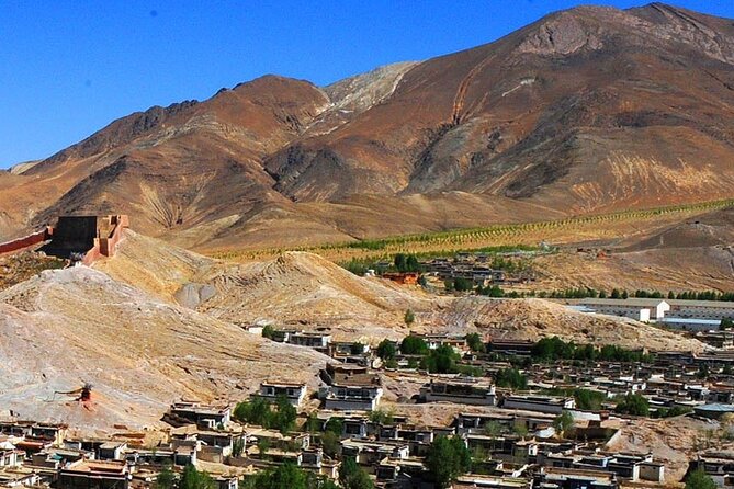 Fixed Departure Tibet Overland Group Joining Tours. - Transport and comfort: van or bus, twin-share rooms, and a real fixed schedule