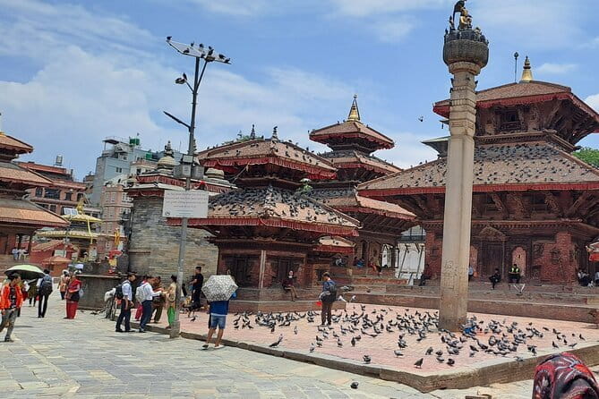 Kathmandu Chandragiri Cable Car and Swayambhunath Private Tour - Swayambhunath Monkey Temple: stupa, shrines, and the all-seeing eyes