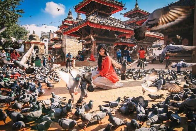 Kathmandu Heritage Day Tour - Boudhanath Stupa, prayer flags and Buddhist atmosphere