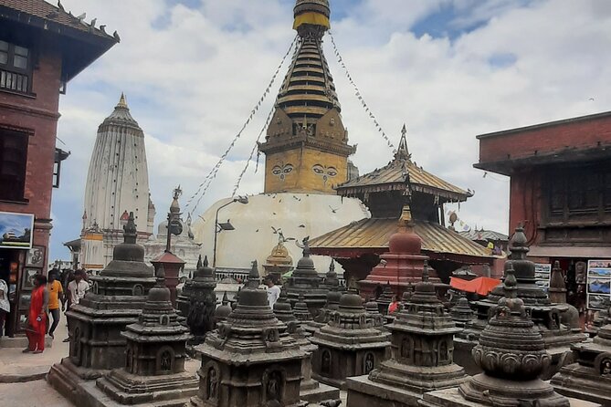 Kathmandu Top 4 or 2 UNESCO World Heritage Sites Day Tour - Stop 2: Boudhanath Stupa and Its Tibetan-Influenced Atmosphere