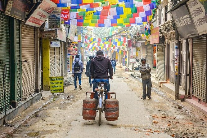 Local Bazaar Walking Tour in Kathmandu with Professional Guide - Indra Chowk streets: spices, textiles, wedding ornaments, and temple details