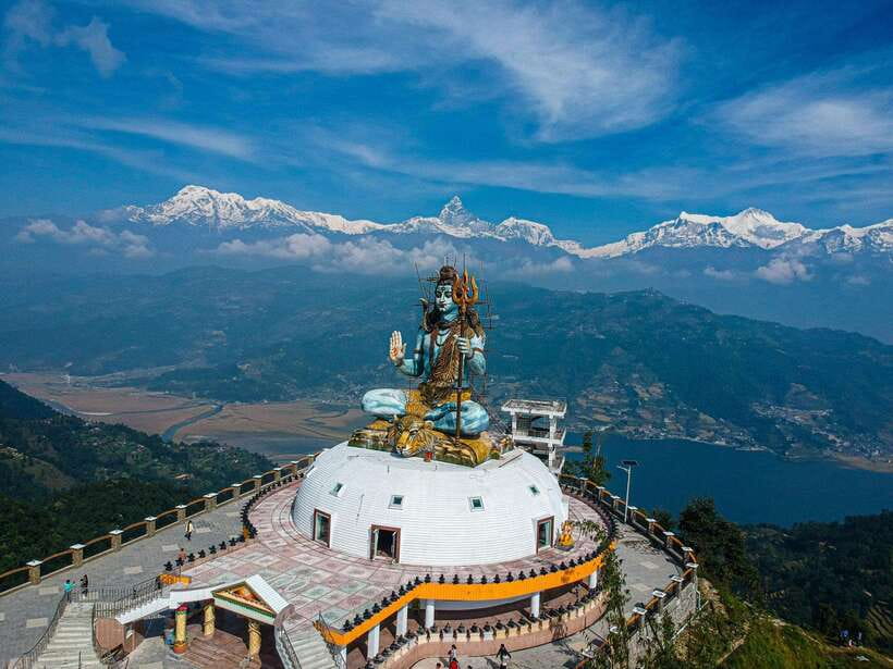 Pokhara: City Sightseeing Group Bus Tour - Pumdikot Shiva Idol, then the World Peace Pagoda views
