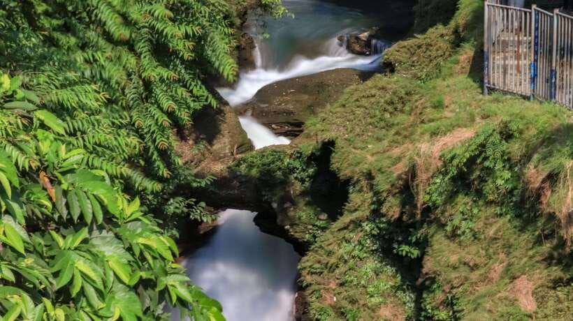 Pokhara: City Sightseeing Group Bus Tour - Davis Falls: the shock of water meeting underground darkness