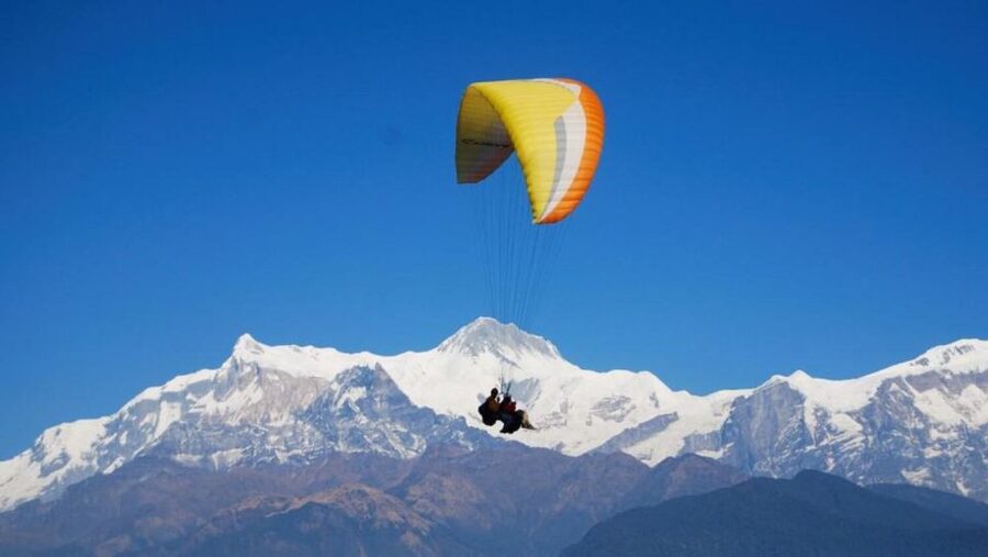 Pokhara: Paragliding Adventure with Photos and Video - Tandem control and safety: how the pilot keeps you comfortable