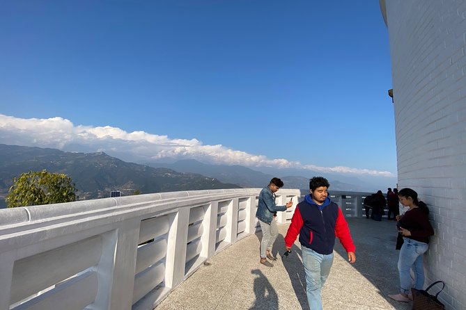 Pokhara: Private Car Drive Tour to World Peace Stupa - Peace Temple area start: pickup, the ride up, and the short hike