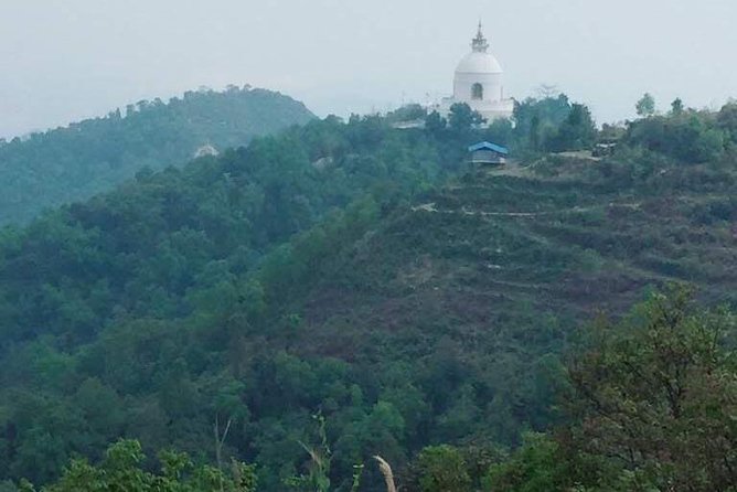 World Peace Stupa Day Hike From Pokhara - Reaching the World Peace Stupa: the viewpoint payoff at 1,100m